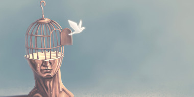 Illustratie van hoofd met vogelkooi waar een vogel uit vliegt