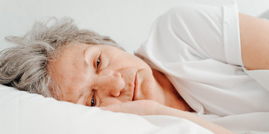 Depressief persoon in bed