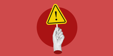 Illustratie van een hand met waarschuwingsbord